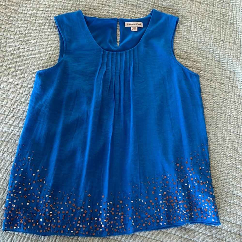 Copper & silver sequins adorn the front of this bright blue Coldwater Creek top.
